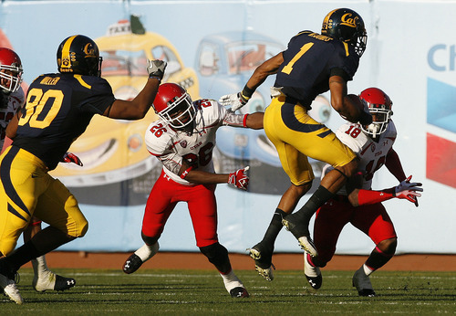 Scott Sommerdorf  |  The Salt Lake Tribune             
Cal WR Marvin Jones jumps near Utah's DB Ryan Lacy, 26, during first half play. The Cal Bears held a 20-0 halftime lead over Utah at AT&T Park in San Francisco, Saturday, October 22, 2011.