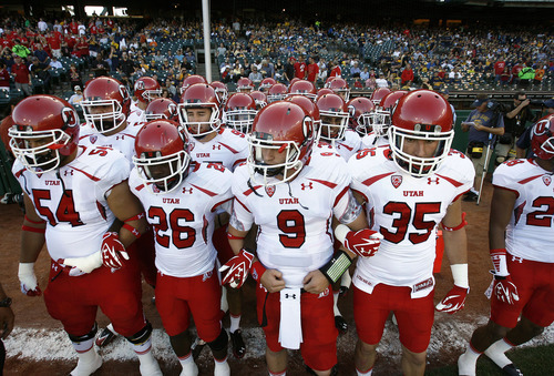 Scott Sommerdorf  |  The Salt Lake Tribune             
Utah quarterback Jon Hays (9) with the rest of the Utes as they prepare to take the field. The Cal Bears held a 20-0 halftime lead over Utah at AT&T Park in San Francisco, Saturday, October 22, 2011.