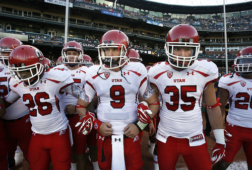 Scott Sommerdorf  |  The Salt Lake Tribune             
Utah quarterback Jon Hays (9) and the rest of the team link arms prior to taking the field. The Cal Bears held a 20-0 halftime lead over Utah at AT&T Park in San Francisco, Saturday, October 22, 2011.