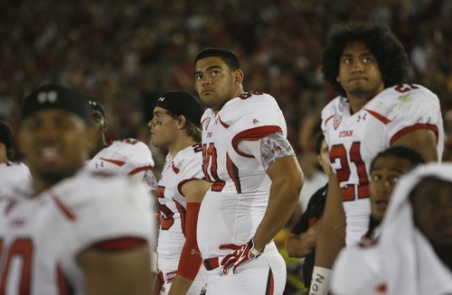 Tribune file photo
Utah Utes defensive end Derrick Shelby (90), defensive back Mike Honeycutt (25), tight end Westlee Tonga (80) and running back Harvey Langi (21) watch in the final seconds of the U.'s loss at USC in its Pac-12 opener.