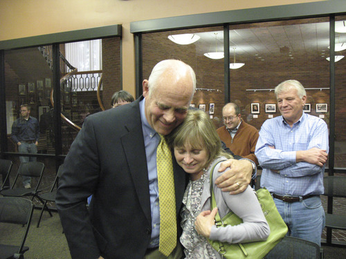 Donald W. Meyers  |  The Salt Lake Tribune
James T. Evans gives his wife, Tana, a hug after being selected to replace Orem Mayor Jerry Washburn Monday. Evans was one of 13 candidates vying to replace the mayor, who died in September.