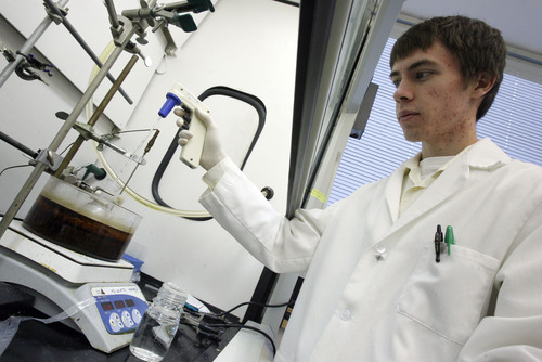 Francisco Kjolseth  |  The Salt Lake Tribune
Ryan Robinson, a U of U senior bioengineering major and former valedictorian at Taylorsville High School, works in the lab at the Nano Institute of Utah on Tuesday, October 25, 2011. Recently Robinson won a national competition for his project on developing gold nano cages that could help deliver chemotherapy directly to cancerous tumors.