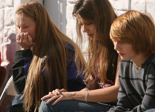 Leah Hogsten | The Salt Lake Tribune 
Dawn Miera, left, her sister Deidre Axelsen and Miera's son Seth Rasmussen attend a press conference at Barker Park on Wednesday, Oct. 26, 2011, honoring the life of 16-year-old Alexis Rasmussen.