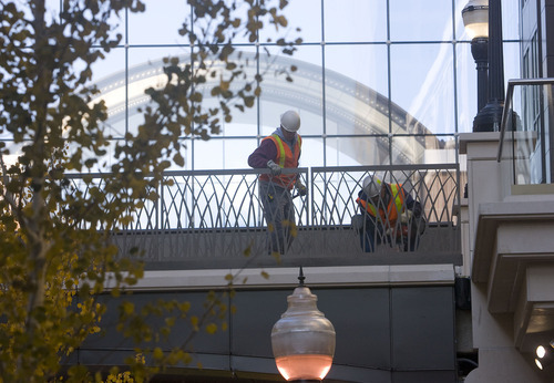 Al Hartmann   |  The Salt Lake Tribune 
Workers continue construction on the City Creek Center on Wednesday, Oct. 26.  The new shopping and dining destination will transform downtown Salt Lake City with its mix of modern architecture, historic restoration and restored creek. It is opening March 22.