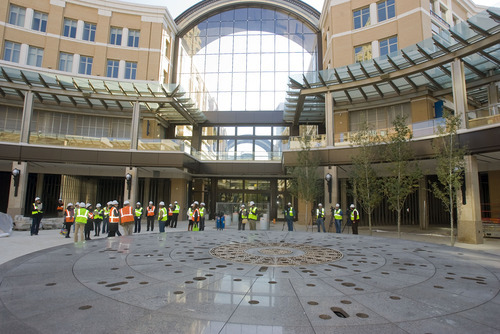 Al Hartmann   |  The Salt Lake Tribune 
Members of the media tour the central plaza with its fountain in the new City Creek Center still under construtction on Wednesday October 26.     The new shopping and dining destination will transform downtown Salt Lake City with it's mix of modern architecture, historic restoration and the above ground flowing City Creek flowing through the setting.     It is opening March 22, 2012.