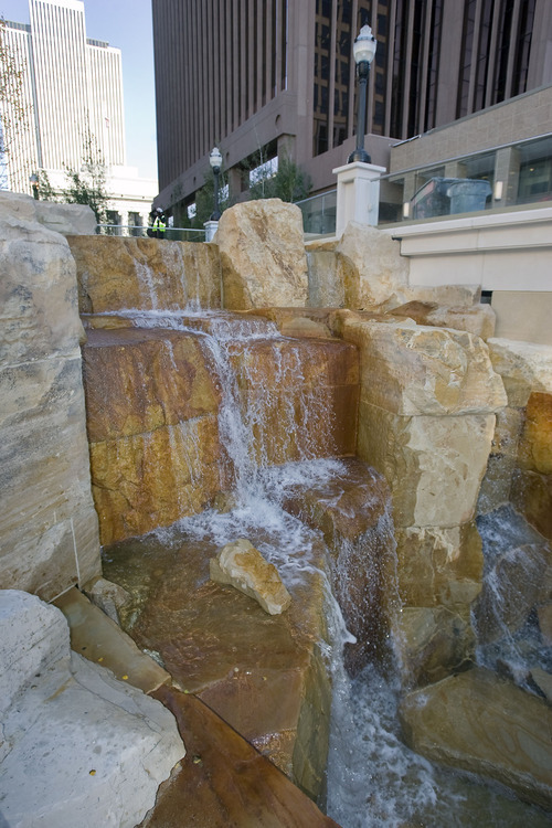 Al Hartmann   |  The Salt Lake Tribune 
Waterfall feature in the new City Creek Center.   The new shopping and dining destination will transform downtown Salt Lake City with it's mix of modern architecture, historic restoration and the above ground flowing City Creek flowing through the setting.     It is opening March 22, 2012.