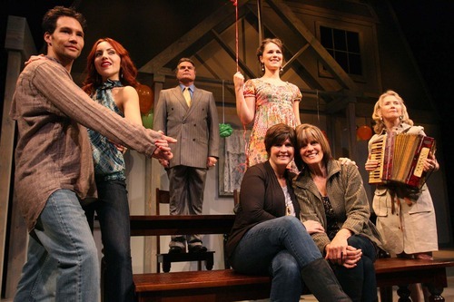 Leah Hogsten | The Salt Lake Tribune 
Playwrights Kate Jarvik Birch and Elaine Jarvik (seated) surrounded by the cast l-r Jesse Peery, Deena Marie Manzanares, Terence Goodman, Amanda Mahoney and Joyce Cohen Tuesday,October 25 2011. 
 Former Salt Lake City newspaper reporter Elaine Jarvik has teamed with daughter Kate Jarvik Birch to write a play about issues of abandonment and family cohesion. Salt Lake Acting Company's world premier of  