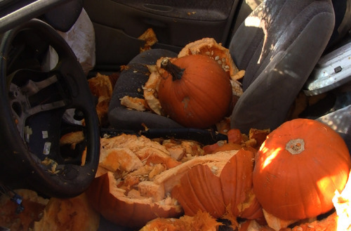Pumpkins dropped from the Trolley Square Water Tower during the K-Bull 93 pumpkin drop litter the seat of a Saturn car. The pumpkins were dropped through the sunroof of the car, 80 feet below on Thursday, October 27, 2011.

Rick Egan  | The Salt Lake Tribune