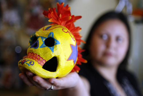 Francisco Kjolseth  |  The Salt Lake Tribune
Veronica Perez is a Utah artist who has playfully taken Day of the Dead images and concepts of the holiday a step further with her modern spin -- punker skulls, etc. -- and reconnected with her cultural roots through the imagery of the traditional holiday.