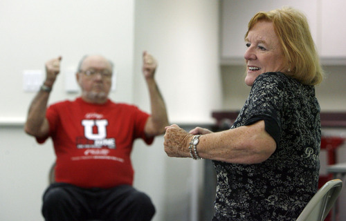 Francisco Kjolseth  |  The Salt Lake Tribune
Margaret Crowell, right, teaches her weekly P.A.C.E. (People with Arthritis can Exercise) class at the Mt. Olympus Senior Center at 1635 E. Murray-Holladay Road on a recent Thursday afternoon as Ellwood Crowell, 79, in background, works his arms.
