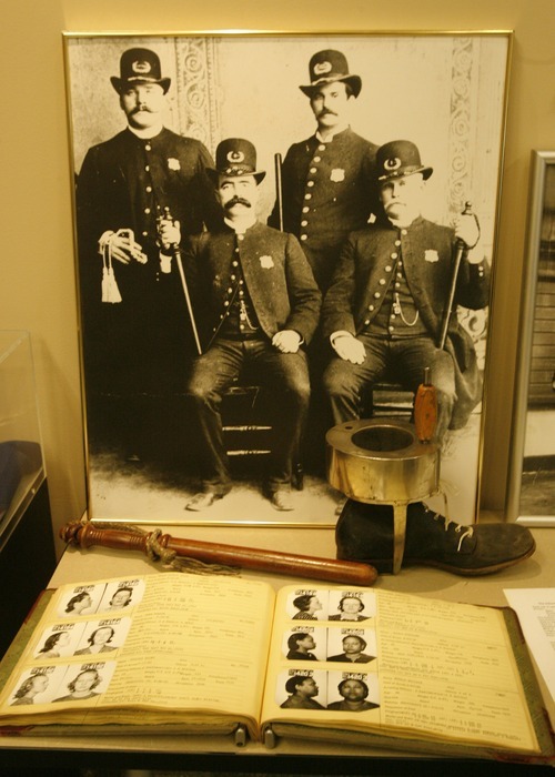 Rick Egan  | The Salt Lake Tribune 
Items on display at the Law Enforcement Historical Collection at the Utah State Archives building. Other interesting items and photographs from the state's law enforcement past, including old firearms, photographs, badges, equipment,and mugshot books, are also on display.