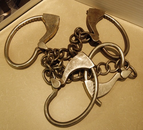 Rick Egan  | The Salt Lake Tribune 
Old handcuffs are on display at the Law Enforcement Historical Collection at the Utah State Archives. Other interesting items and photographs from the state's law enforcement past, including old firearms, photographs, badges, equipment and mugshot books, are also on display.