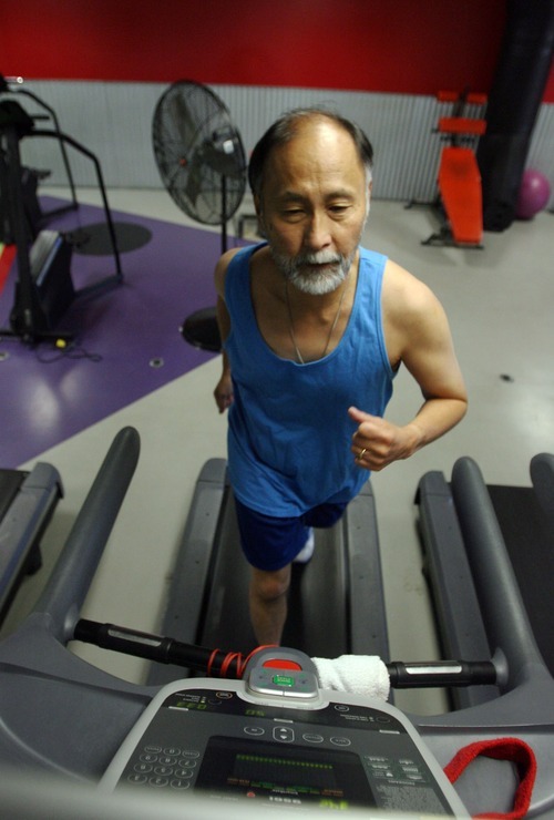 Steve Griffin  |  The Salt Lake Tribune
The Episcopal Diocese in Utah is tackling obesity, encouraging members to bring healthier food to potlucks, grow gardens, use smaller plates. Bishop Scott Hayashi is also leading by example. He wants to run a marathon next year and here runs on a treadmill at Xcel fitness in Salt Lake City.