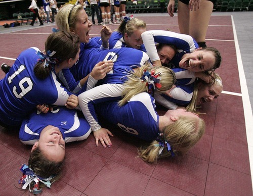 Trent Nelson  |  The Salt Lake Tribune
Richfield players dog pile in celebration after their state championship win. Richfield defeats San Juan for the 2A high school State Championship at Utah Valley University in Orem, UT on Saturday, October 29, 2011.