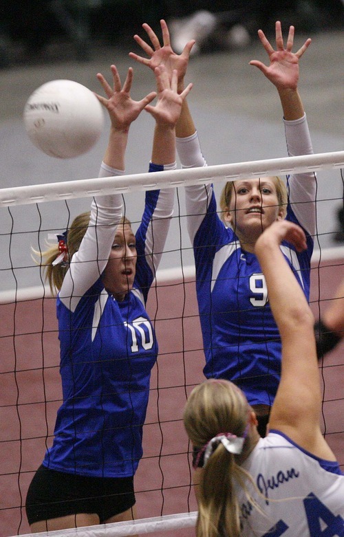 Trent Nelson  |  The Salt Lake Tribune
Richfield's Katelyn Eyre and Carly Jorgensen defending on San Juan's Brooke Lyman. Richfield vs. San Juan high school volleyball, 2A State Championship at Utah Valley University in Orem, UT on Saturday, October 29, 2011.