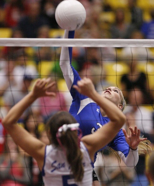 Trent Nelson  |  The Salt Lake Tribune
Richfield's Sloane Roundy at the net with San Juan's Simone Shumway defending. Richfield vs. San Juan high school volleyball, 2A State Championship at Utah Valley University in Orem, UT on Saturday, October 29, 2011.