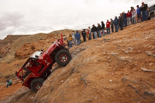 Recreation visitors -- including off-roaders like this Jeep Safari participant climbing Potato Salad Hill last April -- provide 44 percent of Grand County's private-sector jobs, according to a report by Headwaters Economics.
Trent Nelson/The Salt Lake Tribune; 4.11.2009.