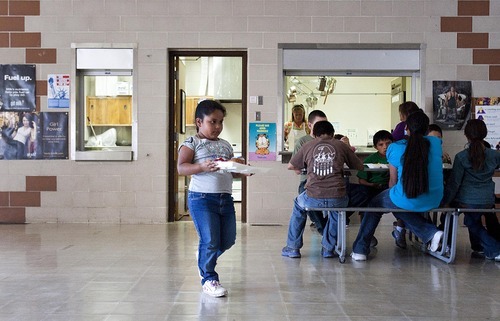 Djamila Grossman | The Salt Lake Tribune

Raenee Bishop-Moon gets lunch at school in Ibapah, Utah, on Friday, Sept. 9, 2011.