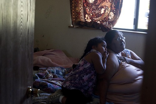 Djamila Grossman | The Salt Lake Tribune

Delia Moon and her granddaughter Raenee Bishop-Moon watch television at their family's home in Ibapah, Utah, on Monday, June 21, 2010.