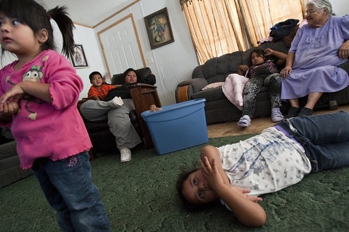 Djamila Grossman | The Salt Lake Tribune

From left: Delila Bishop-Moon, Tarina Bishop, Adrian Villarreal, Raenee Bishop-Moon, LaRae Bishop-Moon and Orlena McCurdy  hang out in their family's home in Ibapah, Utah, on Thursday, Oct. 13, 2011.