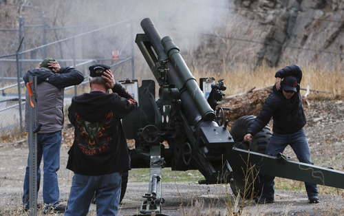 Leah Hogsten  |  Tribune file photo
Todd Greenfield, left, with Snowbird Ski Patrol covers his ears as Snowbird supervisor Brian Buse fires the Howitzer in Big Cottonwood Canyon last November.