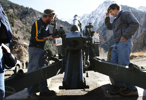 Leah Hogsten  |  The Salt Lake Tribune
UDOT avalanche forecasters Matt McKee  (left) and  Greg Dollhausen (right) prepare the Howitzer for firing into the Stairs Gulch area of Big Cottonwood. Big Cottonwood Canyon road was closed intermittently Wednesday as crews test fire avalanche control devices, according to the Utah Department of Transportation Wednesday, November 17, 2010, in SLC.. The road in Little Cottonwood Canyon will be closed periodically on Thursday. Crews are firing cannons and other devices to test for accuracy and safety for avalanche control at different locations throughout both canyons.