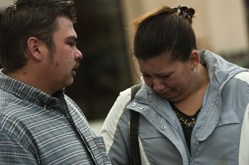 Chris Detrick  |  The Salt Lake Tribune
Brandon and Jennifer Stark walk out of the Utah Foster Care Foundation in Price after seeing their kids for the last time Tuesday October 25, 2011.