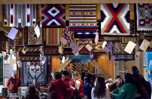 Steve Griffin  |  The Salt Lake Tribune

People enjoy the 21st Annual Navajo Rug Show and Sale in the Snow Park Lodge at Deer Valley  in Park City Friday, November 12, 2010. The event is sponsored by the Adopt-A-Native-Elder ad Navajo weavers. The event runs through Sunday Nov. 14, 2010 and more information is available at www.anelder.org.