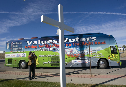 Al Hartmann  |  The Salt Lake Tribune

The Family Research Council Action's Values Voter Bus Tour stopped in Murray on Thursday next to Utah State Trooper roadside crosses that are now facing removal in the court case Davenport vs. American Atheists.