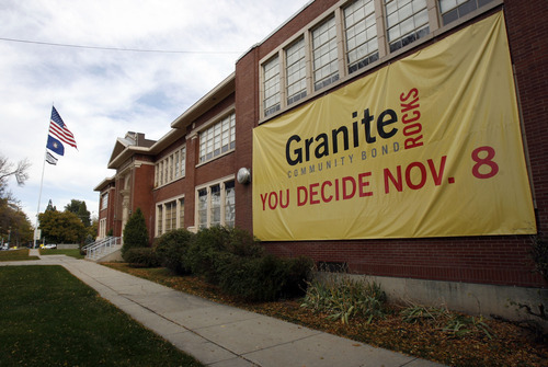 Francisco Kjolseth  |  The Salt Lake Tribune
A large banner hangs on the side of Granite High School on Thursday, November 3, 2011, as questions about whether South Salt Lake is violating campaign finance laws by helping to fund the Granite Rocks campaign about the proposed bond to turn Granite High into a community center.