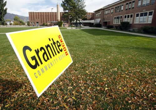 Francisco Kjolseth  |  The Salt Lake Tribune
Signs on the grounds at Granite High School, and a banner on the main classroom building, call attention to Tuesday's bond election in South Salt Lake. Questions are being raised about whether the city violated campaign finance laws by helping to fund the 