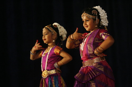 Rick Egan  | The Salt Lake Tribune 

Pragya Prithvi (left) and Svetha Ramayanapu (right) dance during the Divya School of Dance's first annual recital, at the Sri Sri Radha Krishna Temple in Salt Lake City, Saturday, Oct. 29, 2011.