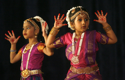 Rick Egan  | The Salt Lake Tribune 

Pragya Prithvi (left) and Svetha Ramayanapu (right) dance during the Divya School of Dance's first annual recital, at the Sri Sri Radha Krishna Temple in Salt Lake City, Saturday, Oct. 29, 2011.