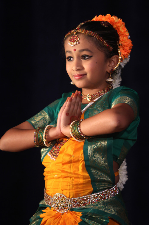 Rick Egan  | The Salt Lake Tribune 

Anoushka Kharkar, dances the Ganapathi Kauthuvam dance, at the Divya School of Dance's first annual recital, at the Sri Sri Radha Krishna Temple in Salt Lake City, Saturday, Oct. 29, 2011.