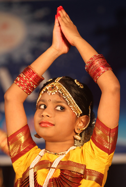 Rick Egan  | The Salt Lake Tribune 

Snekha Rajasekaran, dances the Ganapathi Kauthuvam dance, at the Divya School of Dance's first annual recital, at the Sri Sri Radha Krishna Temple in Salt Lake City, Saturday, Oct. 29, 2011.