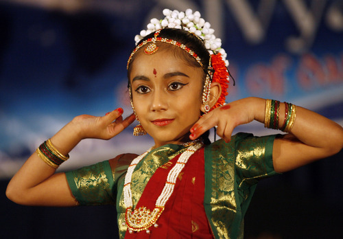 Rick Egan  | The Salt Lake Tribune 

Meghana Avasarala dances during the Divya School of Dance's first annual recital, at the Sri Sri Radha Krishna Temple in Salt Lake City, Saturday, Oct. 29, 2011.