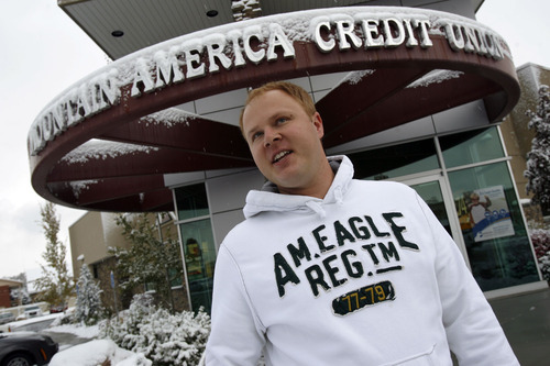 Francisco Kjolseth  |  The Salt Lake Tribune
Weston Kubbe, 32, of Murray is happy to have an extra $125 in his pocket, courtesy of a Bank Transfer Day promotion by Mountain America Credit Union. Kubbe saw a newspaper advertisement about the 