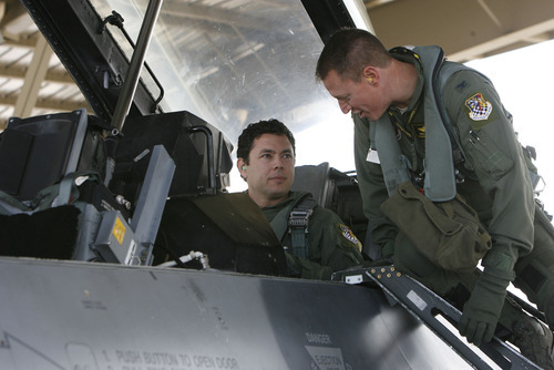 Francisco Kjolseth  |  The Salt Lake Tribune
419th Fighter Wing Vice Commander Pat Wade, right, briefs Congressman Jason Chaffetz on the details of their flight on Saturday for an up-close look at how the F-16 aircraft at Hill Air Force base and its reservists support joint combat operations to protect soldiers on the ground in deployed regions. The 419th is  made up of more than 1,100 personnel and is Utah's only Air Force Reserve unit.