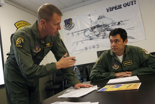 Francisco Kjolseth  |  The Salt Lake Tribune
419th Fighter Wing Vice Commander Pat Wade, left, briefs Congressman Jason Chaffetz on the details of their flight on Saturday for an up-close look at how the F-16 aircraft at Hill Air Force base and its reservists support joint combat operations to protect soldiers on the ground in deployed regions. Congressman Chaffetz flew with the 419th, which is made up of more than 1,100 personnel and is Utah's only Air Force Reserve unit.