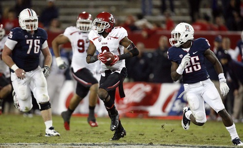 Trent Nelson  |  The Salt Lake Tribune
Utah's Conroy Black (9) runs back an interception during the second half as Utah faces Arizona, college football at Arizona Stadium in Tucson, Arizona, Saturday, November 5, 2011.