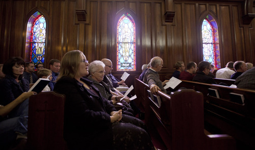 Lennie Mahler  |  The Salt Lake Tribune
Members of an interfaith congregation sing a hymn during a service about being LDS and LGBTQ. The service was part of a three-day conference called 
