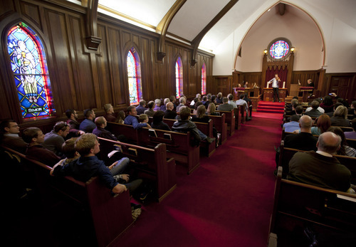 Lennie Mahler  |  The Salt Lake Tribune
Members of an interfaith congregation listen during a service about being LDS and LGBTQ. The service was part of a three-day conference called 