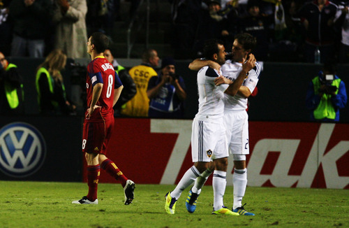 Kim Raff |  The Salt Lake Tribune
Real Salt Lake player Will Johnson reacts as LA Galaxy players (left) Juninho and Todd Dunivant celebrating scoring a goal during the Western Conference Championship at The Home Depot Center in Carson, CA on Sunday, November 6, 2011.