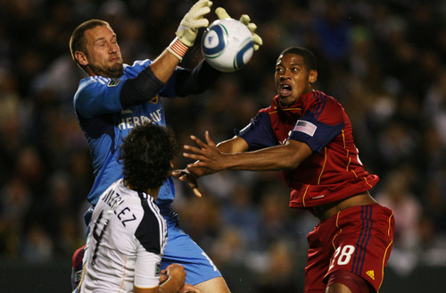 Kim Raff |  The Salt Lake Tribune
Real Salt Lake player (right) Chris Schuler battles LA Galaxy goalie Josh Saunders for a ball in the air during the second half of the Western Conference Championship at The Home Depot Center in Carson, CA on Sunday, November 6, 2011.
