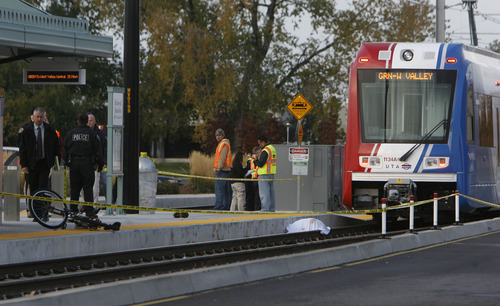 Francisco Kjolseth  |  The Salt Lake Tribune
A bicyclist was killed after being dragged under by a West bound TRAX train at the Redwood Junction station at 1740 West, Research Way near 2770 South and Redwood on Monday morning, November, 7, 2011,  with the first 911 call being made at 6:47 a.m. The crash involved the Green Line train, running from downtown Salt Lake City to West Valley City.