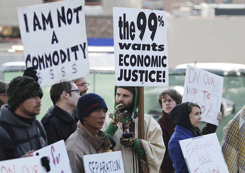 Lennie Mahler  |  The Salt Lake Tribune
Occupy SLC protesters gather at their 