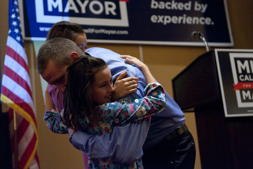 Chris Detrick  |  The Salt Lake Tribune
Mike Caldwell hugs his daughters Kalii, 11, and Chloe, 9, after winning the election for Mayor of Ogden at the Marriott in Ogden Tuesday November 8, 2011.