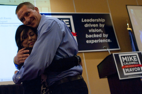 Chris Detrick  |  The Salt Lake Tribune
Mike Caldwell hugs his wife Cathrina after winning the election for Mayor of Ogden at the Marriott in Ogden Tuesday November 8, 2011.