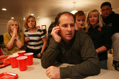 Kim Raff |  The Salt Lake Tribune
Brandon Stephenson watches poll results, which have him trailing, with family in friends for his bid for Mayor of Ogden at his home in Ogden, UT on Tuesday, November 8, 2011.  He went on to lose the race.