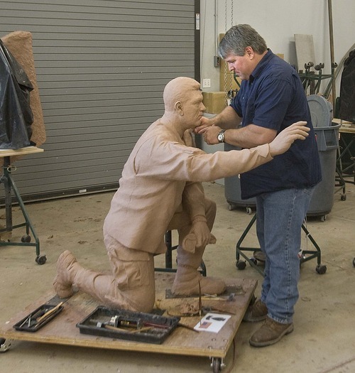 Paul Fraughton  |  The Salt Lake Tribune Brad Taggart, an art professor at Snow College, works on a sculpture that will be part of a Veterans Memorial for the city of Taylorsville on Wednesday  August 3, 2011